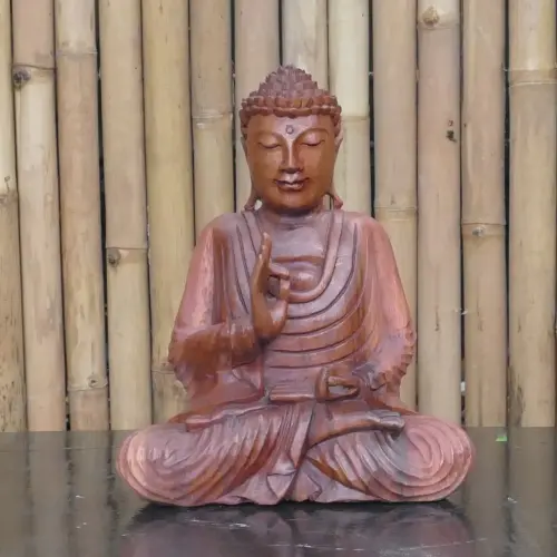 Product image of the product “Seated Buddha made of wood in Abhaya Position - gesture of fearlessness, in the sizes from 30 to 40cm ”
